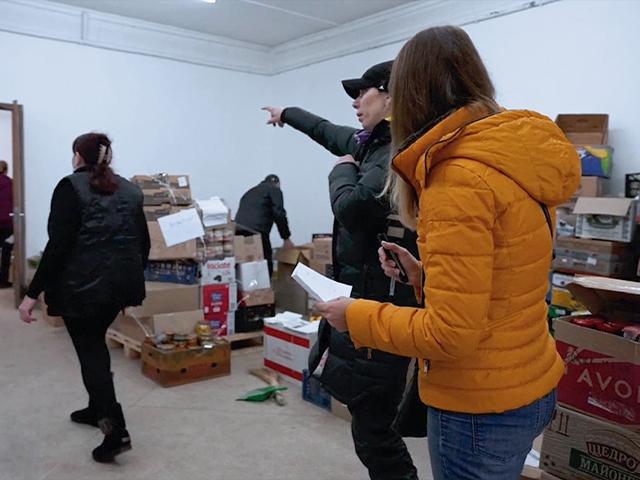 Lviv residents working to stock supplies for refugees.