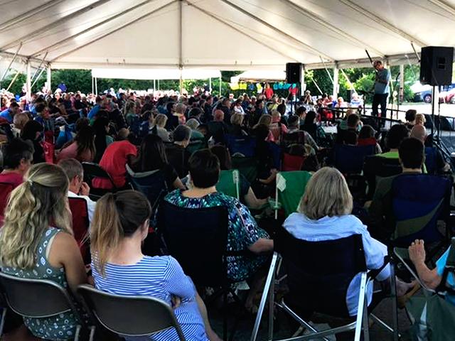 After their church building burned, the Memorial Drive Church of Christ met for services last Sunday under a tent to worship God in their parking lot. (Image credit: Memorial Drive Church of Christ/Facebook)