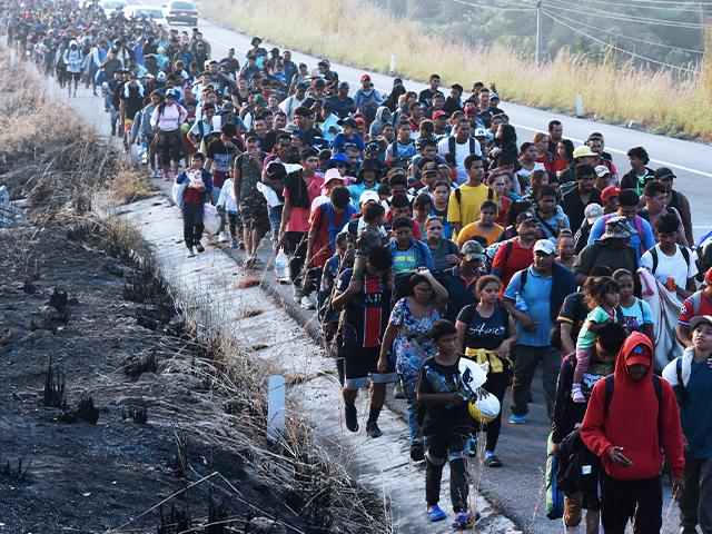 Migrants walk along the highway through Arriaga, Chiapas state in southern Mexico, Jan. 8, 2024, during their journey north toward the U.S. border. (AP Photo/Edgar H. Clemente)