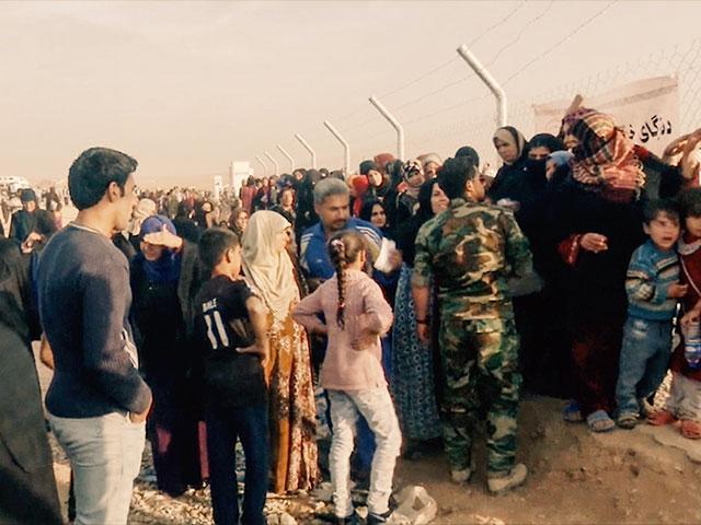 Mosul refugees, CBN News image, Jonathan Goff