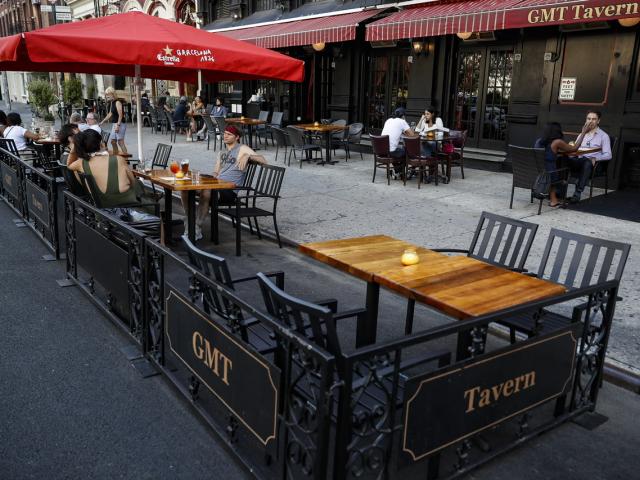 Image Source: AP Photo/John Minchillo