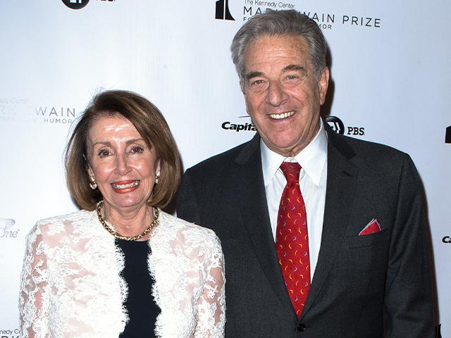 Nancy Pelosi and her husband Paul Pelosi (Photo by Owen Sweeney/Invision/AP)
