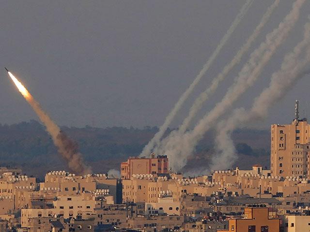 Rockets are launched from the Gaza Strip towards Israel, in Gaza City, Sunday, Aug. 7, 2022. (AP Photo/Hatem Moussa, File)