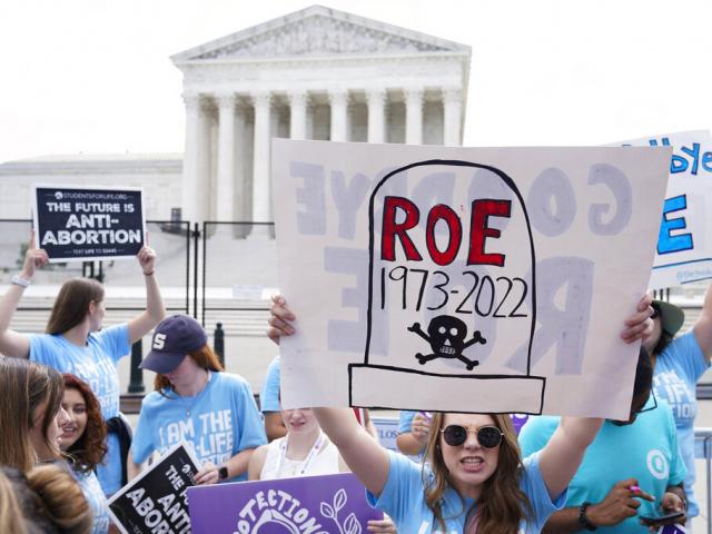 Demonstrators protest about abortion outside the Supreme Court in Washington, Friday, June 24, 2022.(AP Photo/Jacquelyn Martin)