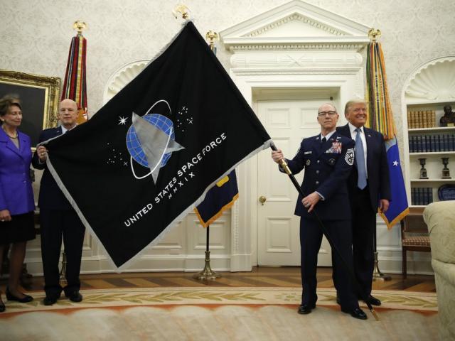 The United States Space Force flag as it is presented in the Oval Office of the White House (AP Photo/Alex Brandon)