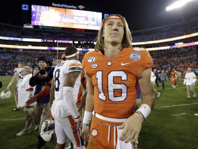 Clemson quarterback Trevor Lawrence (16) is seen following the Atlantic Coast Conference championship NCAA college football game in Charlotte, N.C., Saturday, Dec. 7, 2019. Clemson won 62-17. (AP Photo/Gerry Broome)