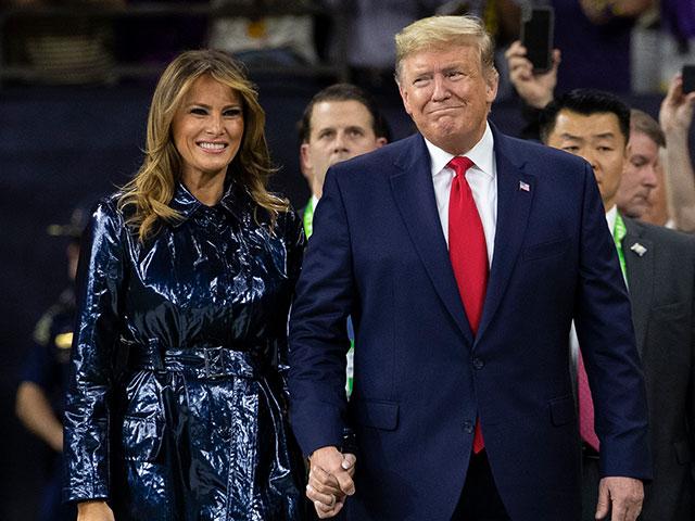 President Donald Trump and first lady Melania Trump arrive for the College Football Playoff National Championship game between LSU and Clemson, Monday, Jan. 13, 2020, in New Orleans. (AP Photo/ Evan Vucci)