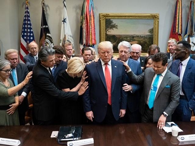 Evangelical leaders pray over President Trump at the White House, October 2019 (AP Photo)