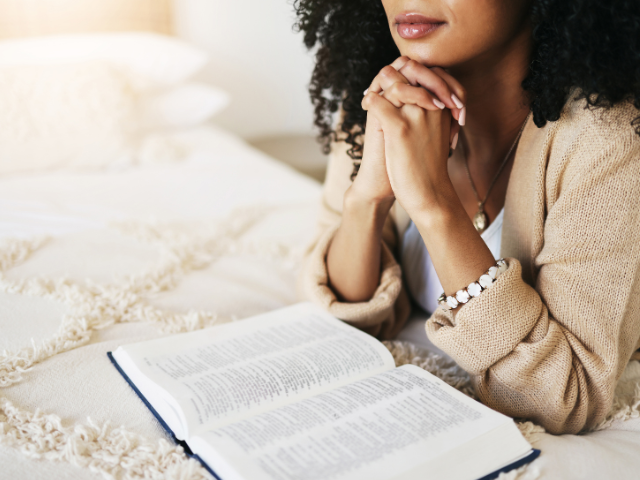 Woman thinking Bible
