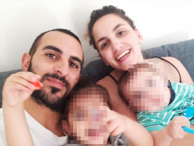 Terror victim Yotam Ovadia, his wife, Tal, and two children, Harel, 2, and Itai, 7 months, Photo, GPO
