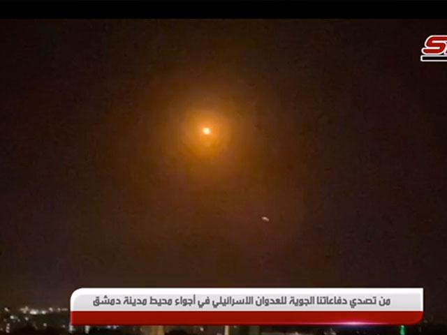 Trace of light for purported missile near Damascus. 15 Feb 2021. Screenshot of SANA video via AP