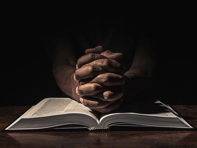 hand on a bible