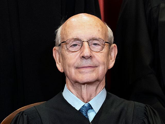 Associate Justice Stephen Breyer sits during a group photo at the Supreme Court in Washington, Friday, April 23, 2021. (Erin Schaff/The New York Times via AP, Pool)