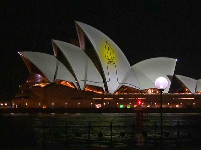 The Sydney Opera House is illuminated with a candle as Australia marks a day of reflection in Bondi following the Hanukkah terror attack. Dec. 21, 2025. Photo credit: Screenshot, Australian Parliament TV/AP. The Sydney Opera House is illuminated with a candle as Australia marks a day of reflection in Bondi following the Hanukkah terror attack. Dec. 21, 2025. Photo credit: Screenshot, Australian Parliament TV/AP.