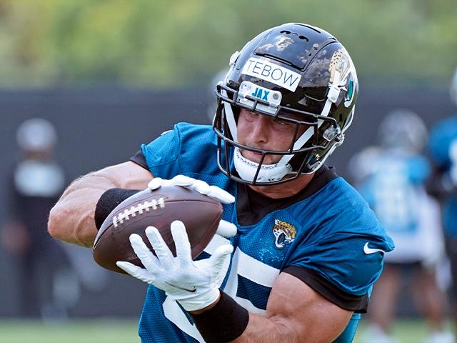 Jacksonville Jaguars tight end Tim Tebow catches a pass during NFL football practice, Thursday, May 27, 2021, in Jacksonville, Fla. (AP Photo/John Raoux)