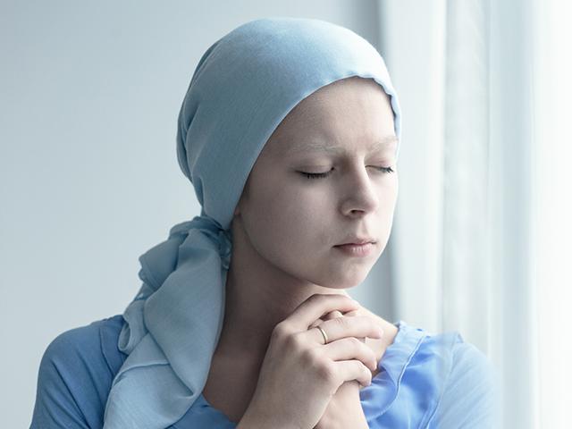 woman with cancer praying
