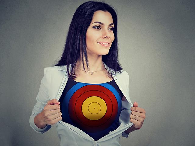 woman with bulls eye target on her chest
