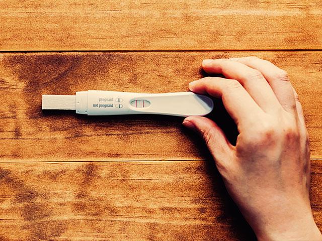 womanpregnancytestas