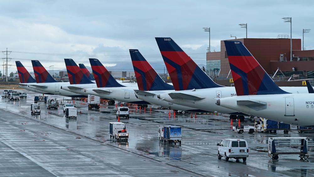 Delta planes are shown at their gates at Salt Lake City International Airport, in Salt Lake City. (AP Photo/Rick Bowmer)