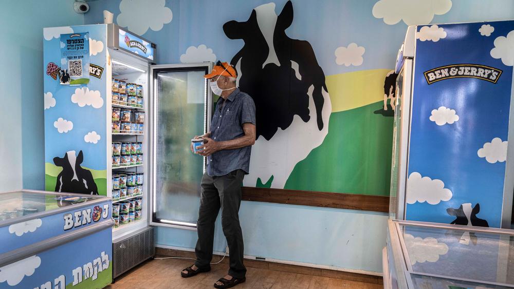 An Israeli shops at the Ben & Jerry's ice-cream factory in the Be'er Tuvia Industrial area, Tuesday, July 20, 2021. 