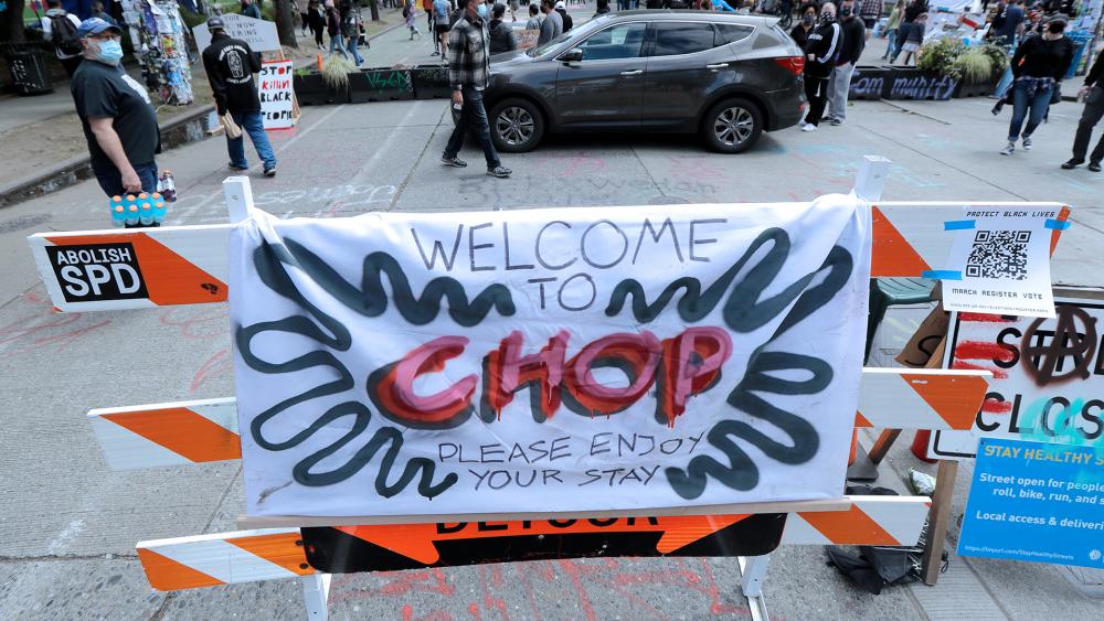 The Capitol Hill Occupied Protest (CHOP) zone in Seattle. Protesters calling for police reform have taken over several blocks near downtown Seattle. CHOP is a change from CHAZ (Capitol Hill Autonomous Zone) that was used earlier (AP Photo/Ted S. Warren)