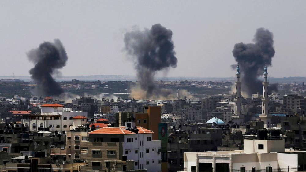 In this July 16, 2014 file photo, smoke rises after Israeli missile strikes hit the northern Gaza Strip. (AP Photo/Adel Hana, File)