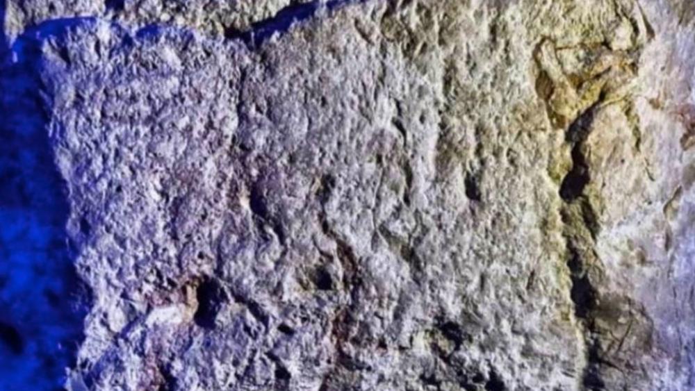 A rock discovered in the City of David with an inscription describing biblical King Hezekiah's works, Photo Credit: Eli Shukron.