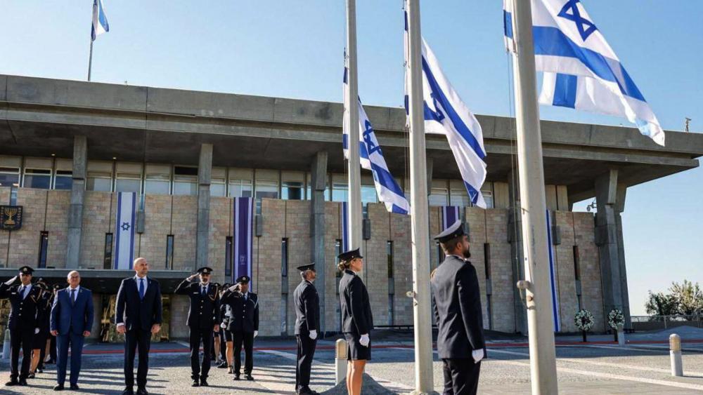 Israeli flags are lowered to half-mast at the Knesset for October 7th Remembrance Day. Photo Credit: Noam Moshkovich, Knesset Spokesperson.