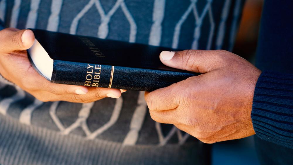 Man holding bible