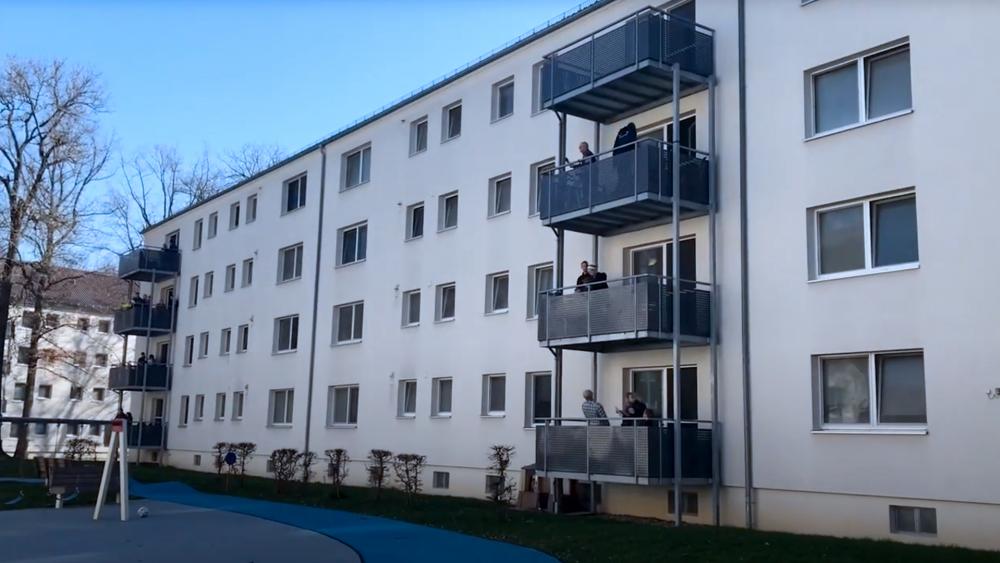 Screen capture of a US military housing in Germany where a worship service was held from a balcony.
