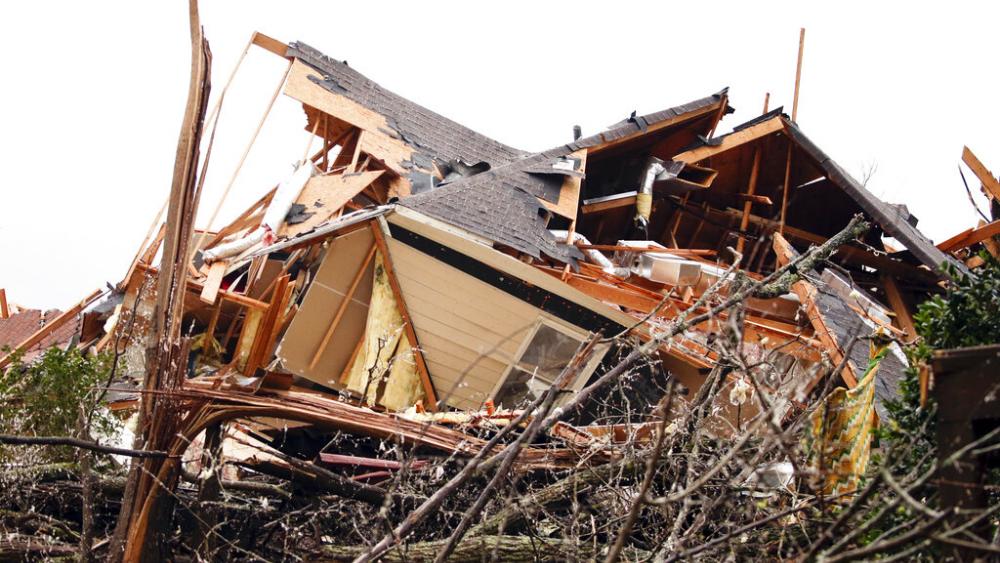 A house is totally destroyed after a tornado touches down south of Birmingham, Ala. in the Eagle Point community damaging multiple homes, Thursday, March 25, 2021. (AP Photo/Butch Dill)