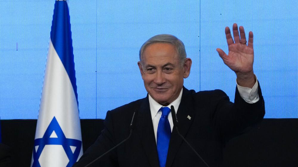 Benjamin Netanyahu, former Israeli Prime Minister and the head of Likud party, waves to his supporters  in Jerusalem, Wednesday, Nov. 2, 2022. (AP Photo/Maya Alleruzzo)