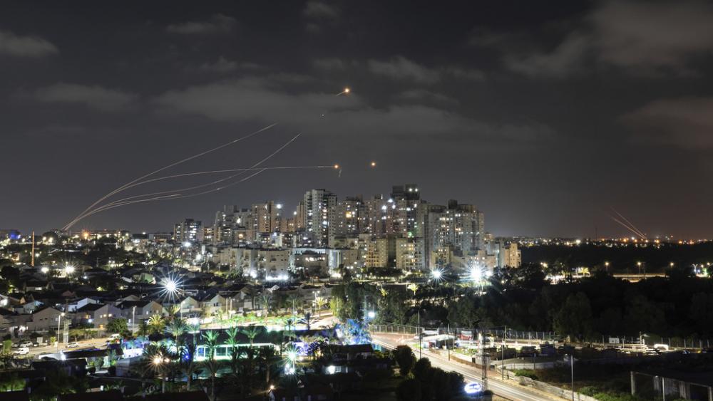 Israel&#039;s Iron Dome missile defense system fires interceptors at rockets launched from the Gaza Strip, in Ashkelon, southern Israel. Saturday, May 13, 2023. (AP Photo/Tsafrir Abayov)