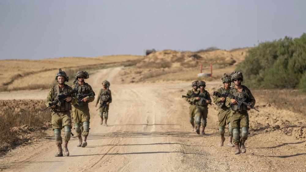Israeli soldiers are seen near the Gaza Strip border in southern Israel, Thursday, June 13, 2024. The army is battling Palestinian militants across Gaza in the war ignited by Hamas&#039; Oct. 7 attack into Israel. (AP Photo/Ohad Zwigenberg)