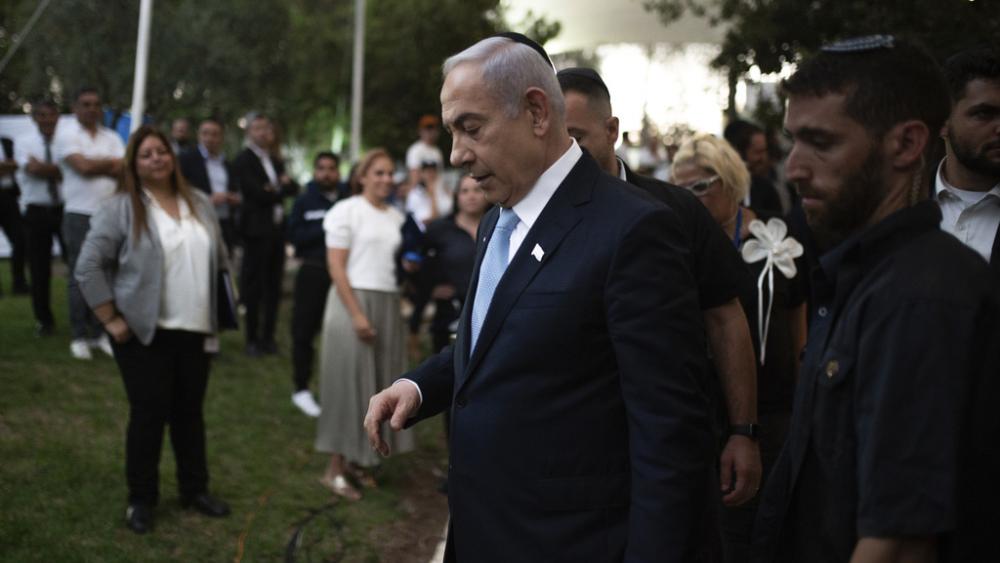 Israeli Prime Minister Benjamin Netanyahu, center, attends the state memorial for Zionist pioneer Ze&#039;ev Jabotinsky, at Mount Herzl Military Cemetery in Jerusalem, Sunday, Aug. 4, 2024. (Naama Grynbaum/Pool Photo via AP)