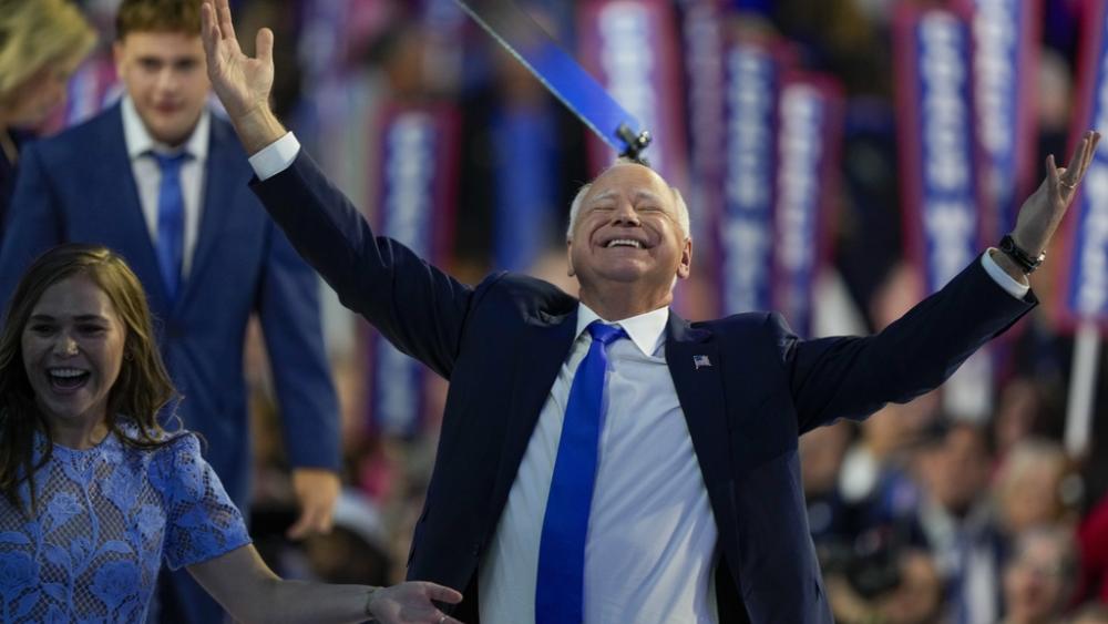 Democratic vice presidential nominee Minnesota Gov. Tim Walz reacts during the Democratic National Convention, Aug. 21, 2024, in Chicago. (AP Photo/Matt Rourke)