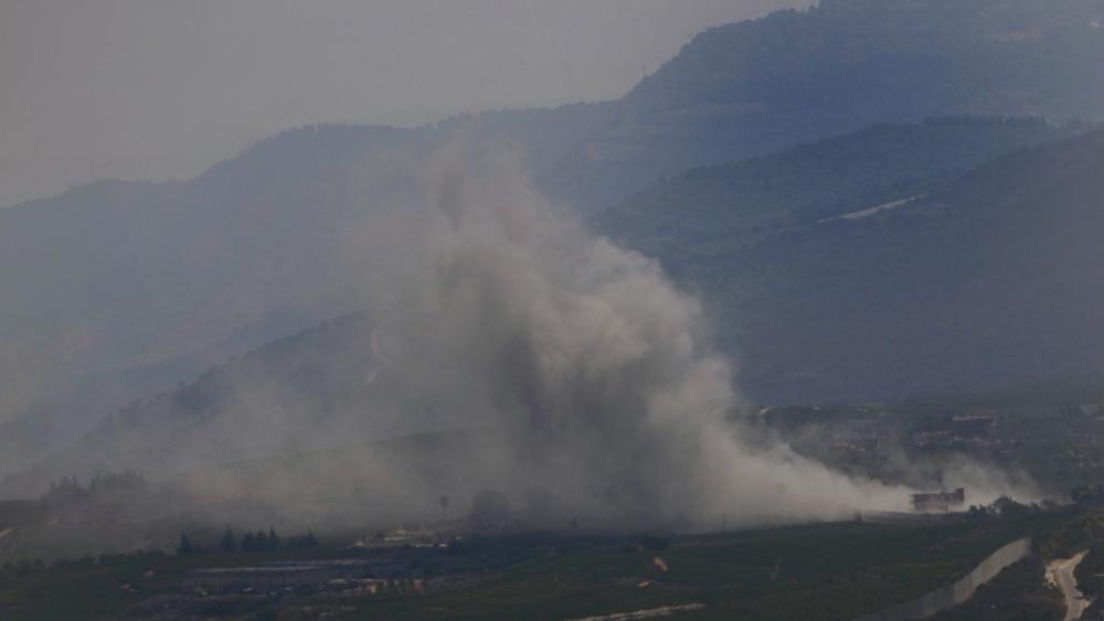 Smoke rises from an Israeli airstrike on Kfar Kila, a Lebanese border village with Israel in south Lebanon, as it seen from Marjayoun town in south Lebanon, Monday, Aug. 26, 2024. (AP Photo/Hussein Malla)