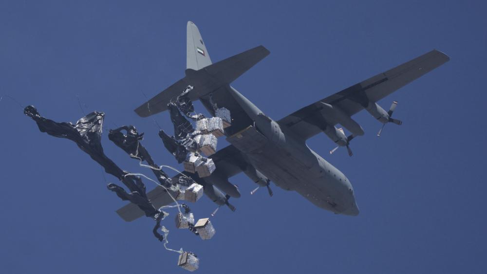 Humanitarian aid is airdropped to Palestinians over Gaza City, Gaza Strip, Sunday, July 27, 2025. (AP Photo/Jehad Alshrafi)