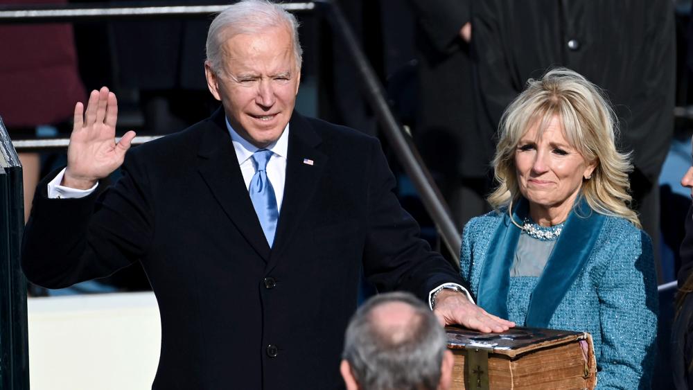 Joe Biden is sworn in as the 46th president of the United States by Chief Justice John Roberts as Jill Biden holds the Bible during the 59th Presidential Inauguration at the U.S. Capitol, Wednesday, Jan. 20, 2021.(Saul Loeb/Pool Photo via AP)