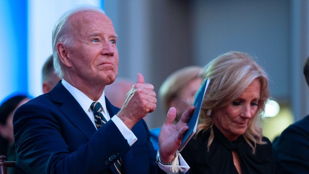 President Joe Biden gives a thumbs up as NATO Secretary General Jens Stoltenberg delivers remarks at summit, July 9, 2024, in Washington. (AP Photo/Evan Vucci)