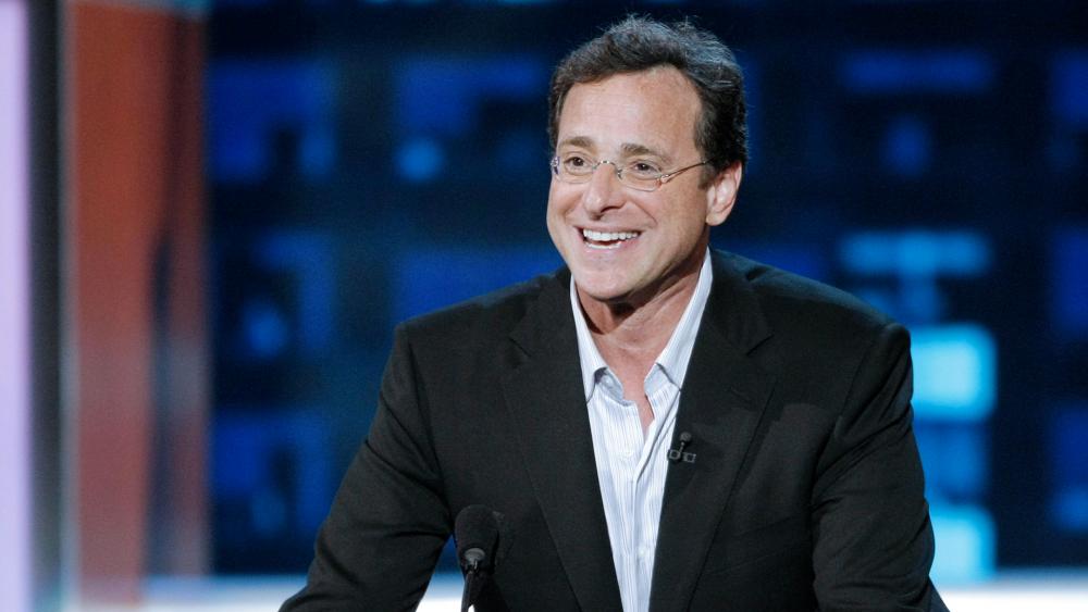In this Aug. 3, 2008, file photo, actor and roastee Bob Saget speaks at the &quot;Comedy Central Roast of Bob Saget,&quot; in Burbank, Calif. (AP Photo/Dan Steinberg, File)