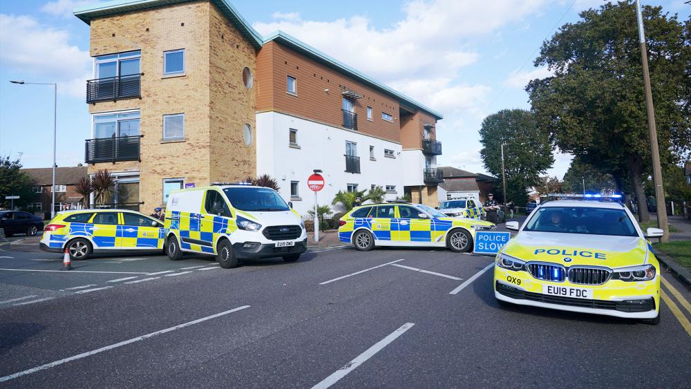 Emergency services at the Belfairs Methodist Church where Conservative UK MP Sir David Amess was stabbed to death in Essex, England (Yui Mok/PA via AP) 