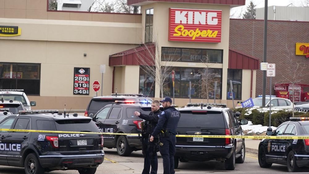 Police work on the scene outside of a King Soopers grocery store where a shooting in Boulder, Colo. (AP Photo/David Zalubowski)