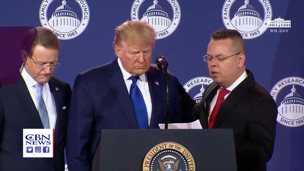 Pastor Andrew Brunson prays for President Donald Trump at the Values Voters Summit (Photo CBN News)