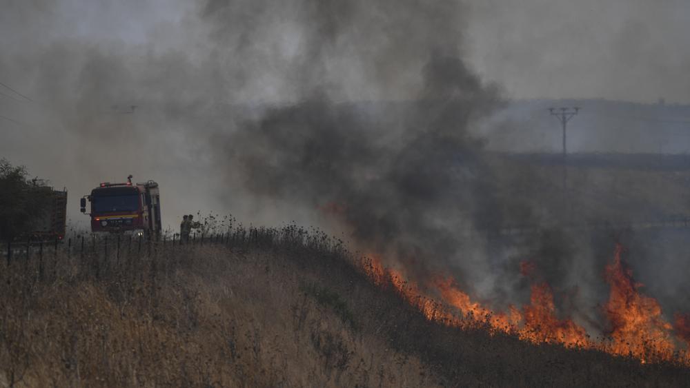 A fire broke out in northern Israel following an attack from Hezbollah in Lebanon, Thursday, July 4, 2024. (AP Photo/Gil Eliyahu)