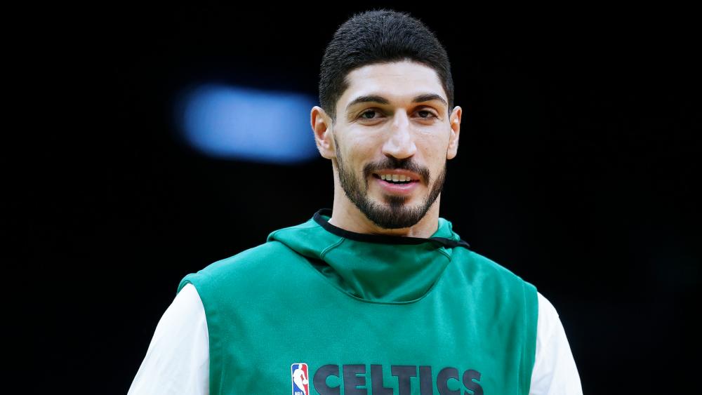 Boston Celtics&#039; Enes Kanter warms up before a preseason NBA basketball game against the Charlotte Hornets in Boston, Sunday, Oct. 6, 2019. (AP Photo/Michael Dwyer)