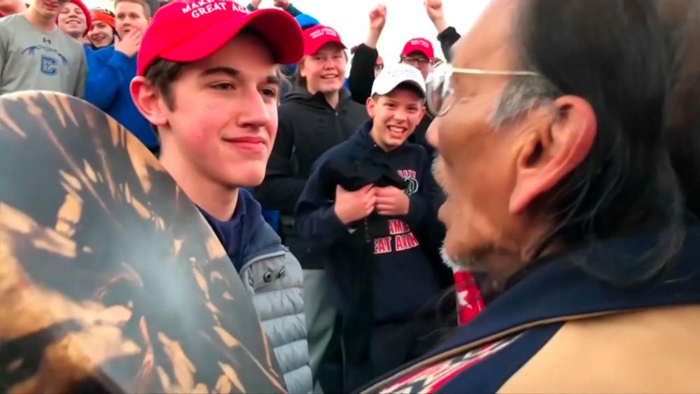 Catholic student Nick Sandmann being confronted by Nathan Phillips. (Photo credit: screen capture from video)