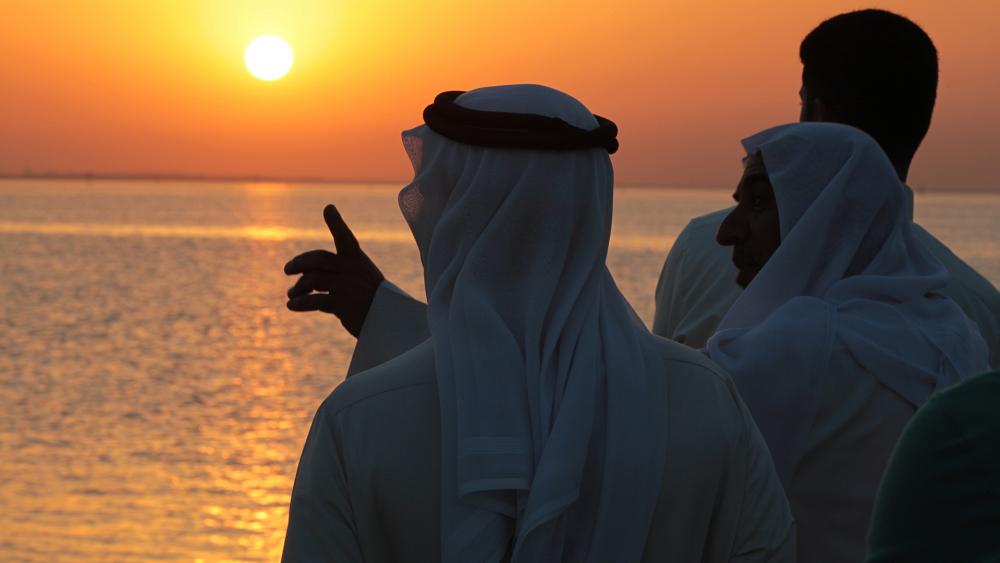 The Persian Gulf at sunset as seen from the western village of Karzakan, Bahrain. (AP Photo/Hasan Jamali)