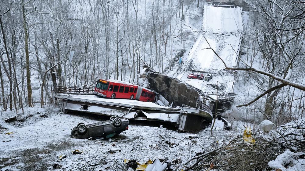 A bus was on a bridge when it collapsed Friday Jan. 28, 2022, in Pittsburgh&#039;s East End. (AP Photo/Gene J. Puskar)