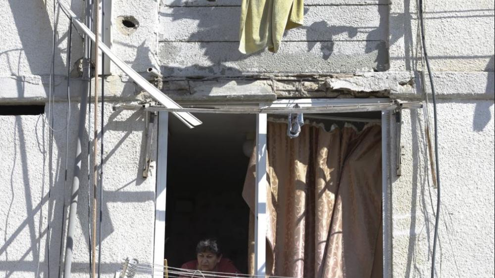 Damage is seen in a residential area after it was hit a by a rocket fired from Gaza in the southern Israeli city of Ashkelon, Israel, Sunday, May 5, 2019. (AP Photo/Ariel Schalit)